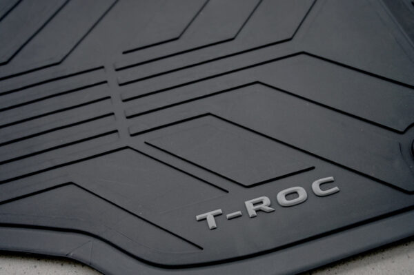 Volkswagen T-ROC logo on rubber mat logo close up